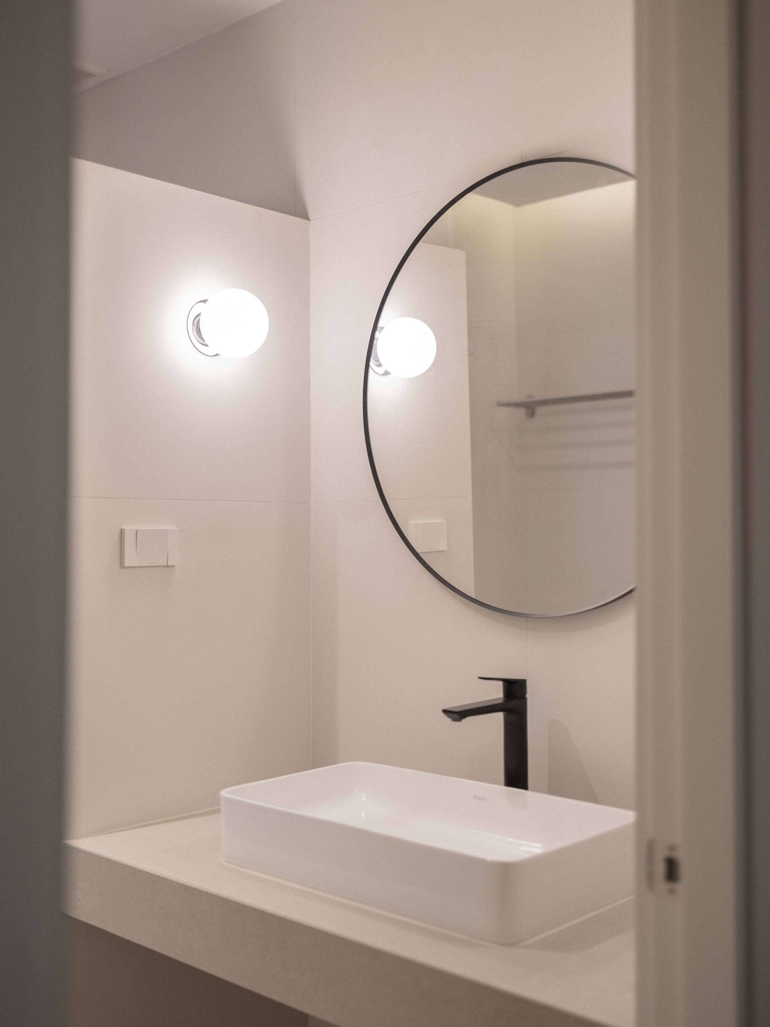 Bathroom vanity and mirror at Aube Chiang Mai