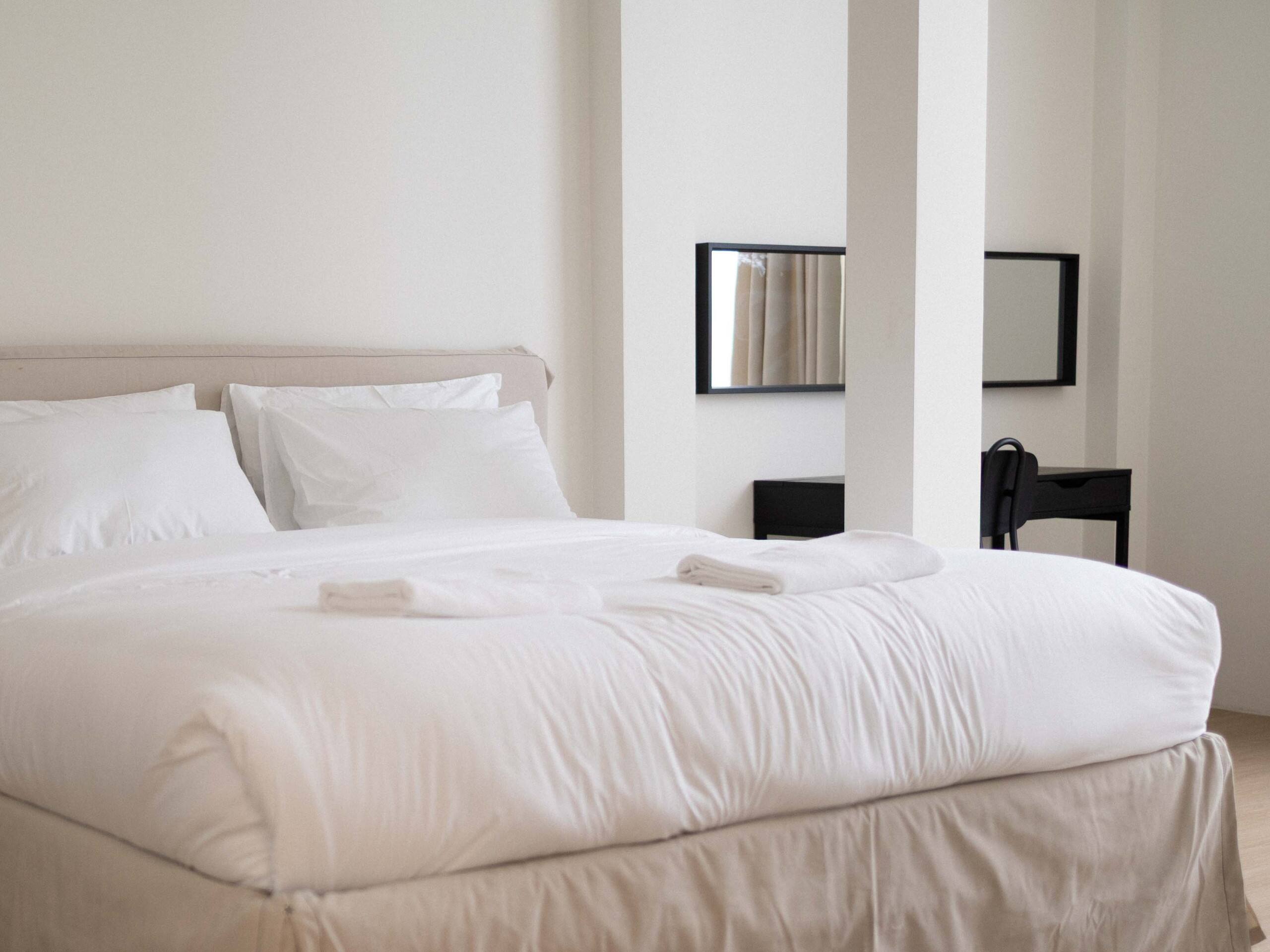 Bedroom 1 with a king bed and soft natural light