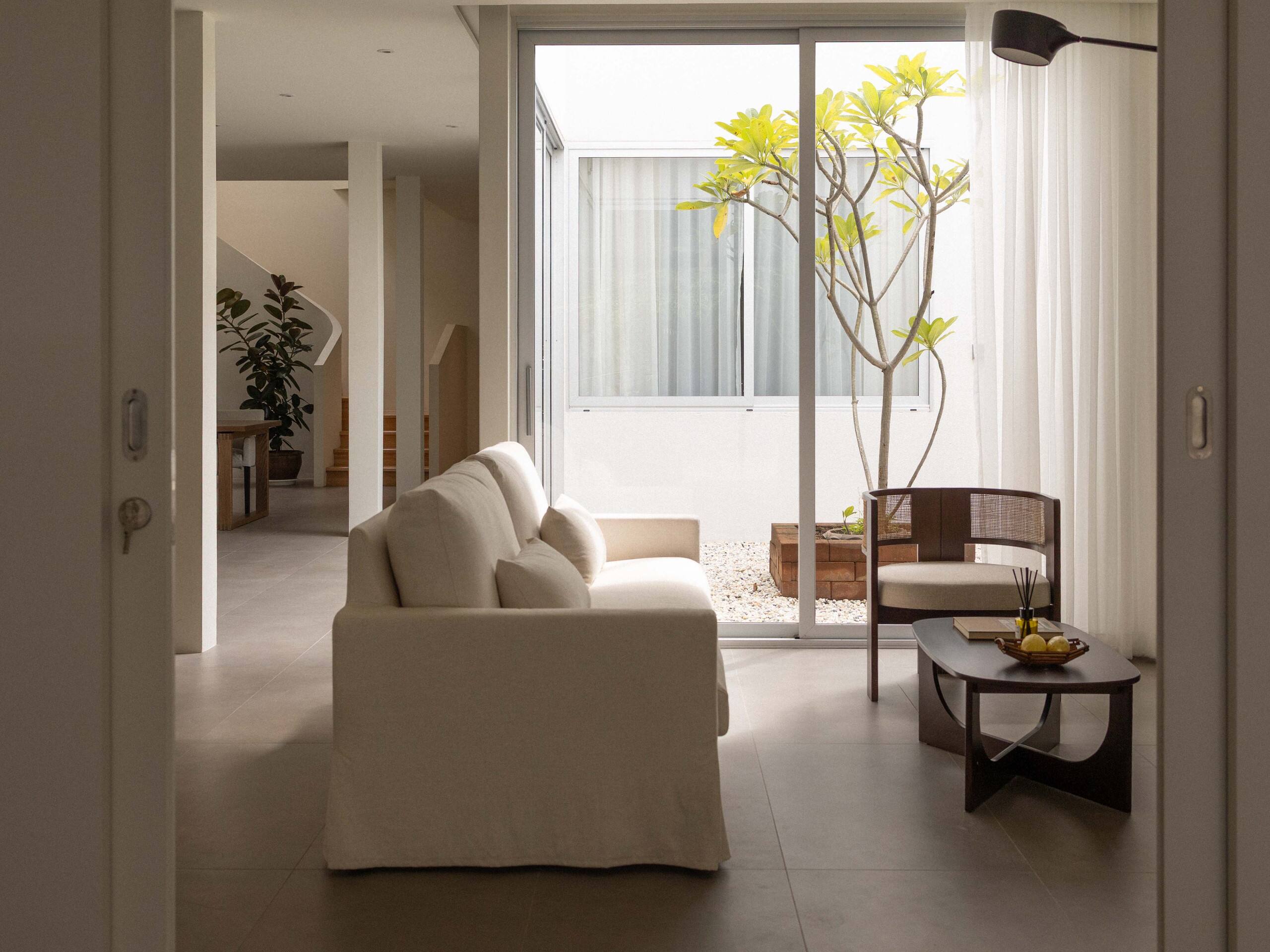Light-filled main living room at Aube Chiang Mai